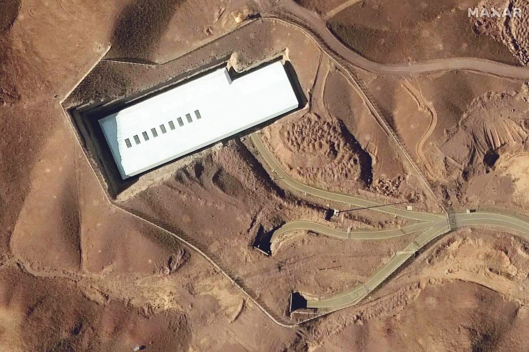 A uranium enrichment site amidst mountains and roads.