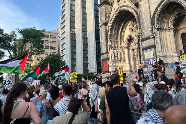 The crowd outside the Cathedral of St. John the Divine in New York City, just a few blocks away from Columbia University, on Sunday.