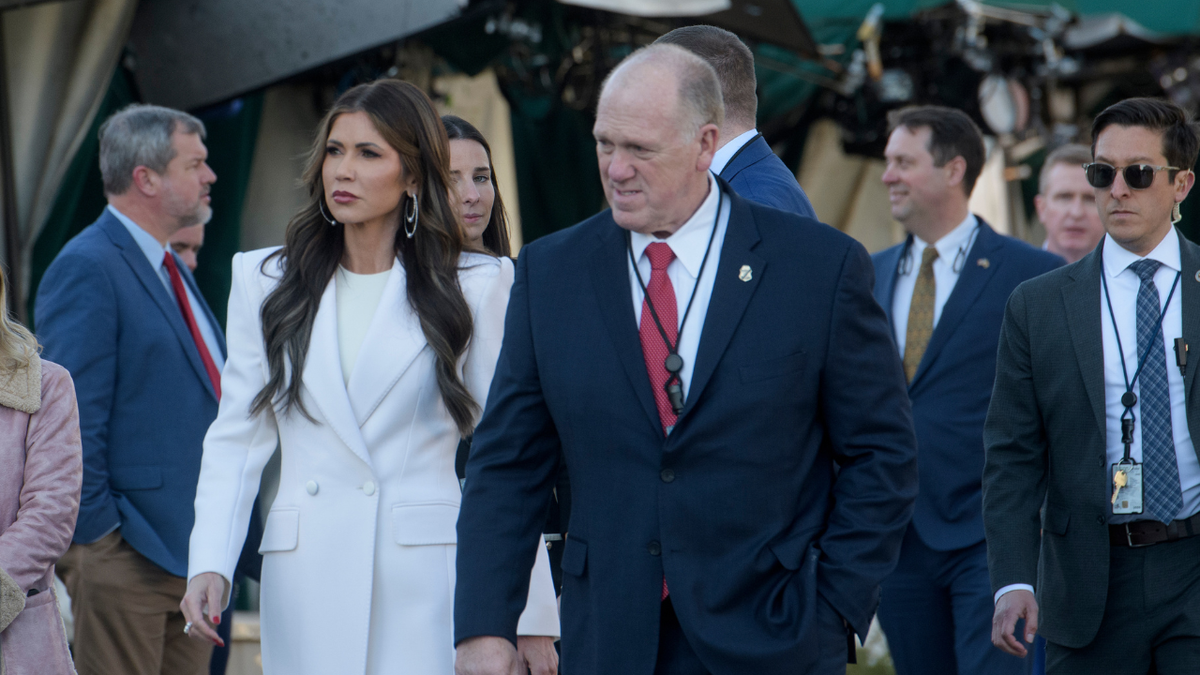 Homeland Security Secretary Kristi Noem, left, and White House border czar Tom Homan walk at the White House in Washington, Wednesday, Jan. 29, 2025.