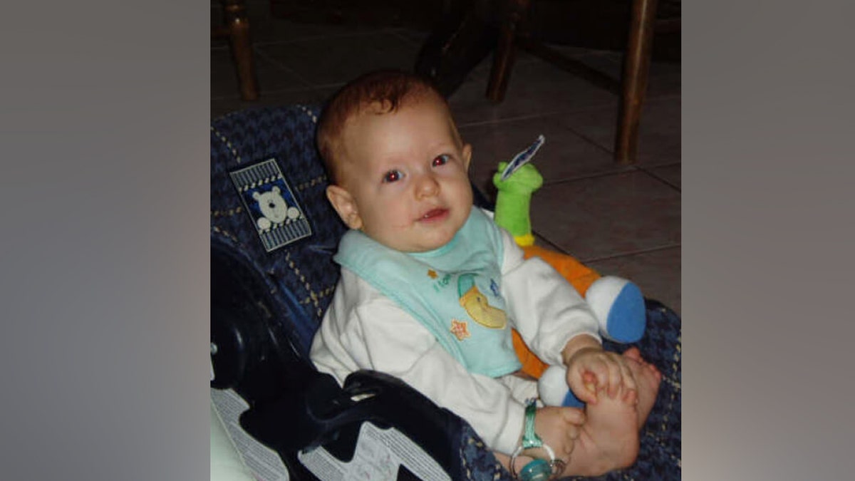 Bryce Balfour sitting in a carseat