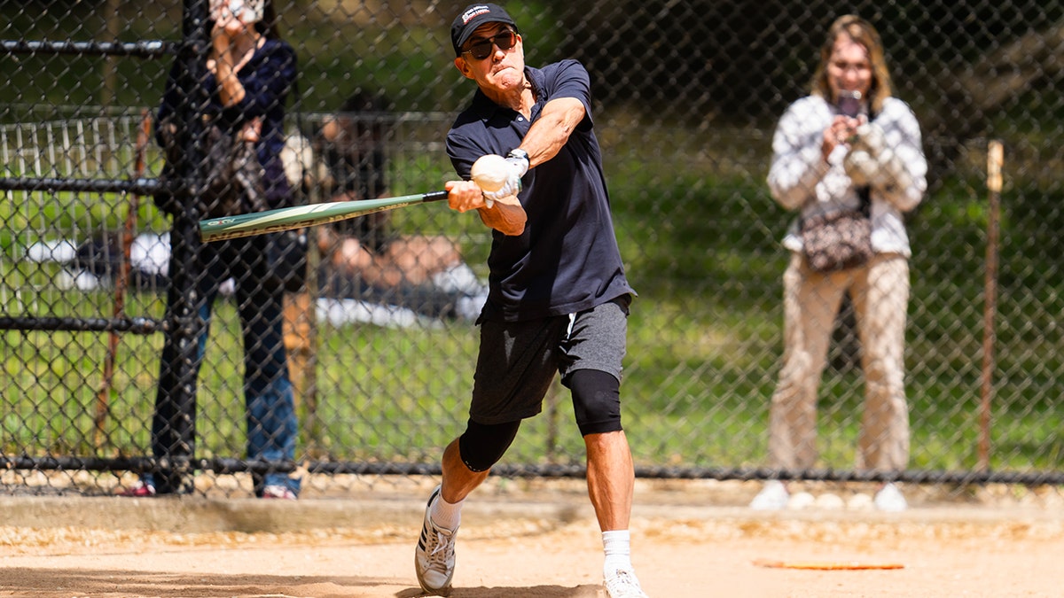 Clooney hit a few balls in Central Park while playing with the league.