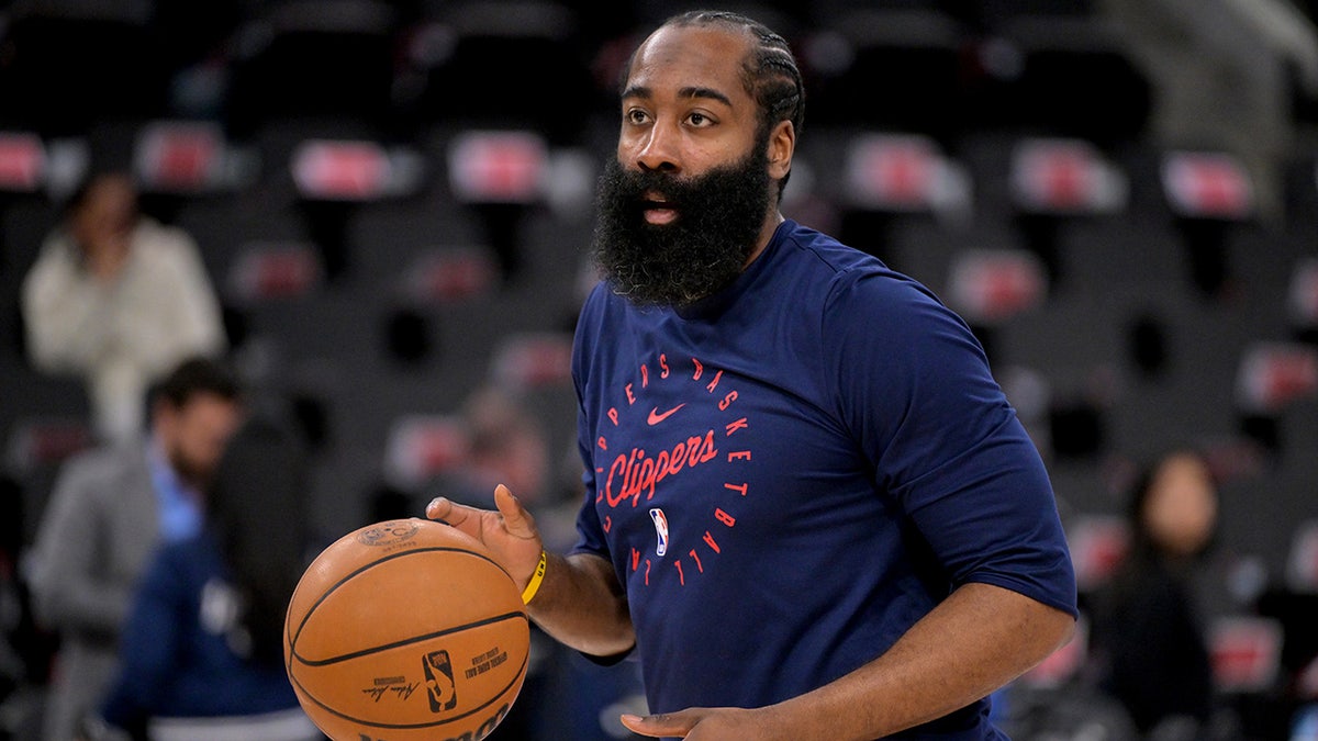 James Harden dribbles